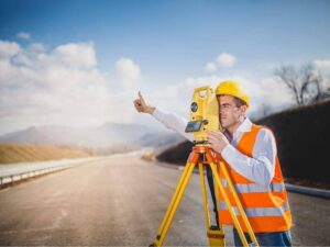 licensed surveyor preliminary plat site herriman utah - herriman land surveying Licensed surveyor checking field conditions and terrain for a preliminary plat site in Herriman Utah